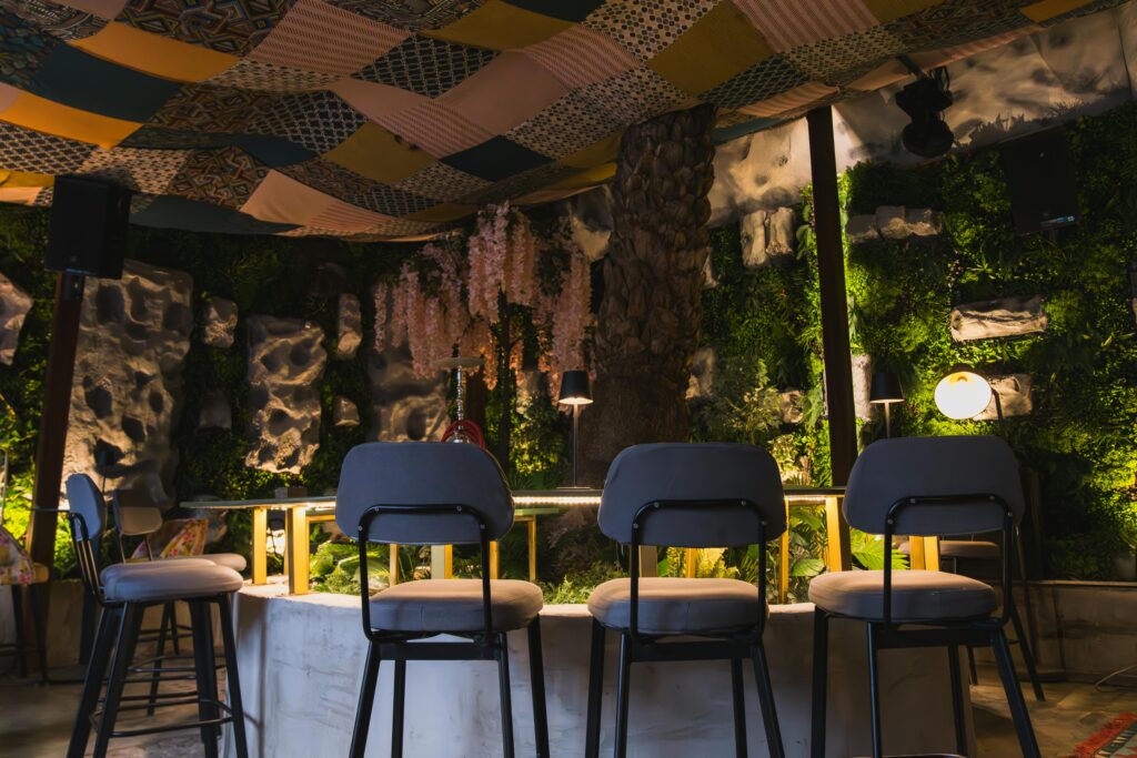 pexels-photo-32639829-32639829 Trendy indoor lounge with stylish bar stools and ambient lighting, perfect for nightlife and social gatherings.